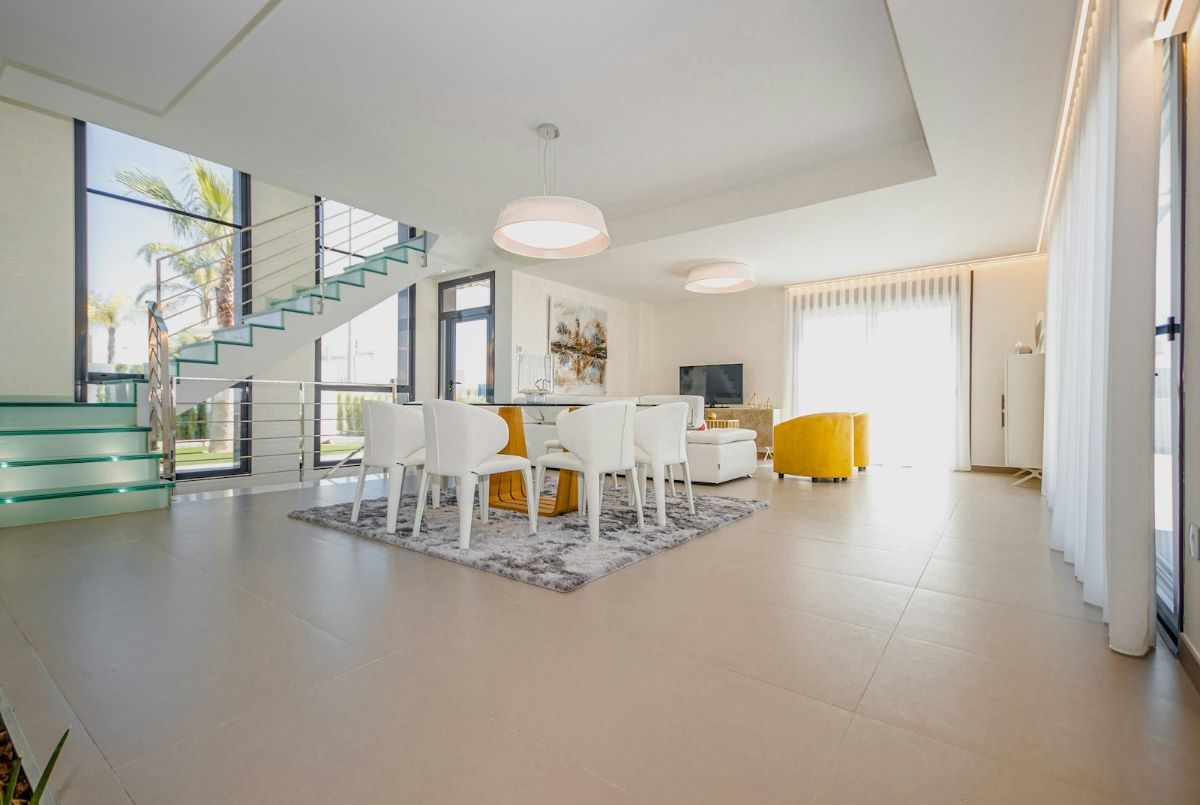 Không gian phòng khách và bếp mở trong nhà phố Vinhomes Cần Giờ